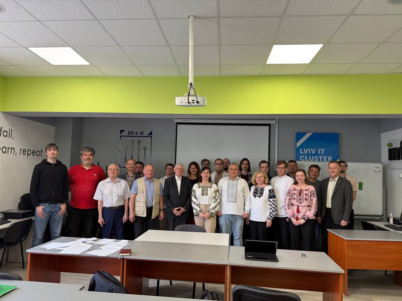 Group photo of event participants in a laboratory classroom
