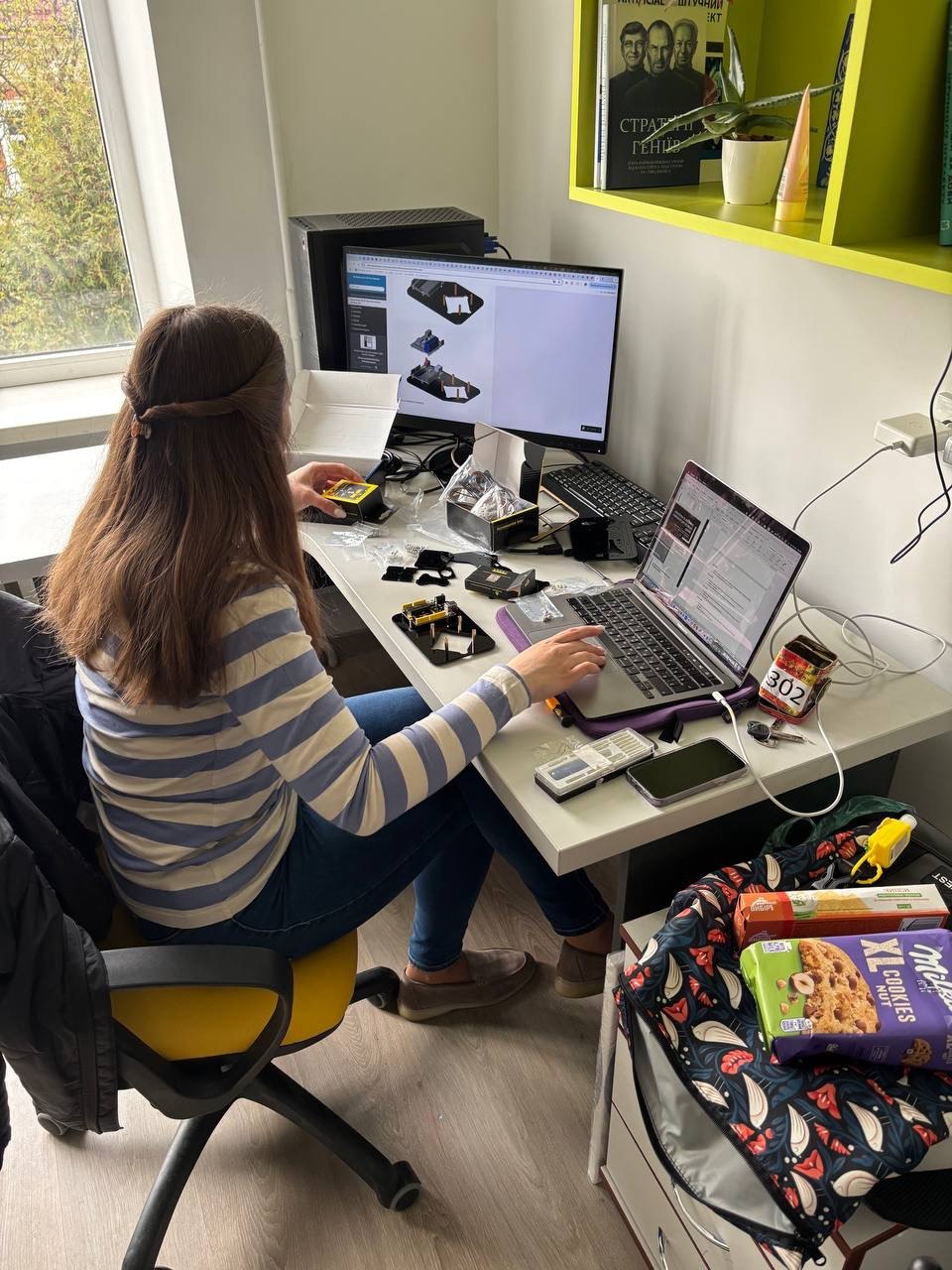Student working on a hardware prototype in the laboratory